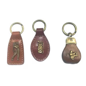 Set mit 3 handgefertigten Schlüsselanhängern aus Leder: Golfschläger