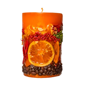 Bougie parfumée aux vrais fruits dans un emballage de Noël